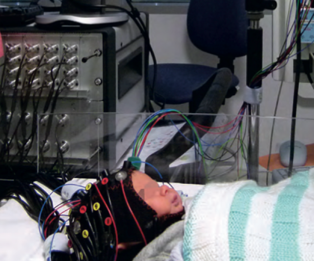 Optical-EEG study set up on a healthy infant in a side room of the neonatal intensive care unit