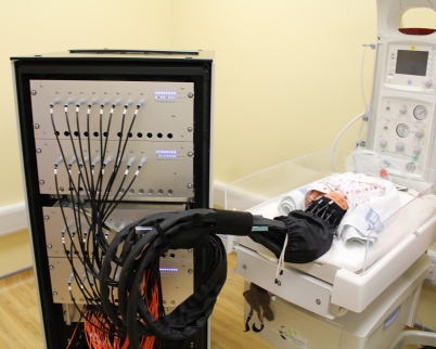 Set up of a healthy infant for a MONSTIR2 scan in the Evelyn Perinatal Imaging Centre